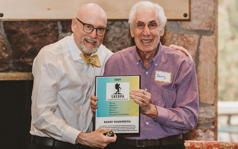 Barry Rosenberg receiving SHERPA award as presented by Bob Barrows.